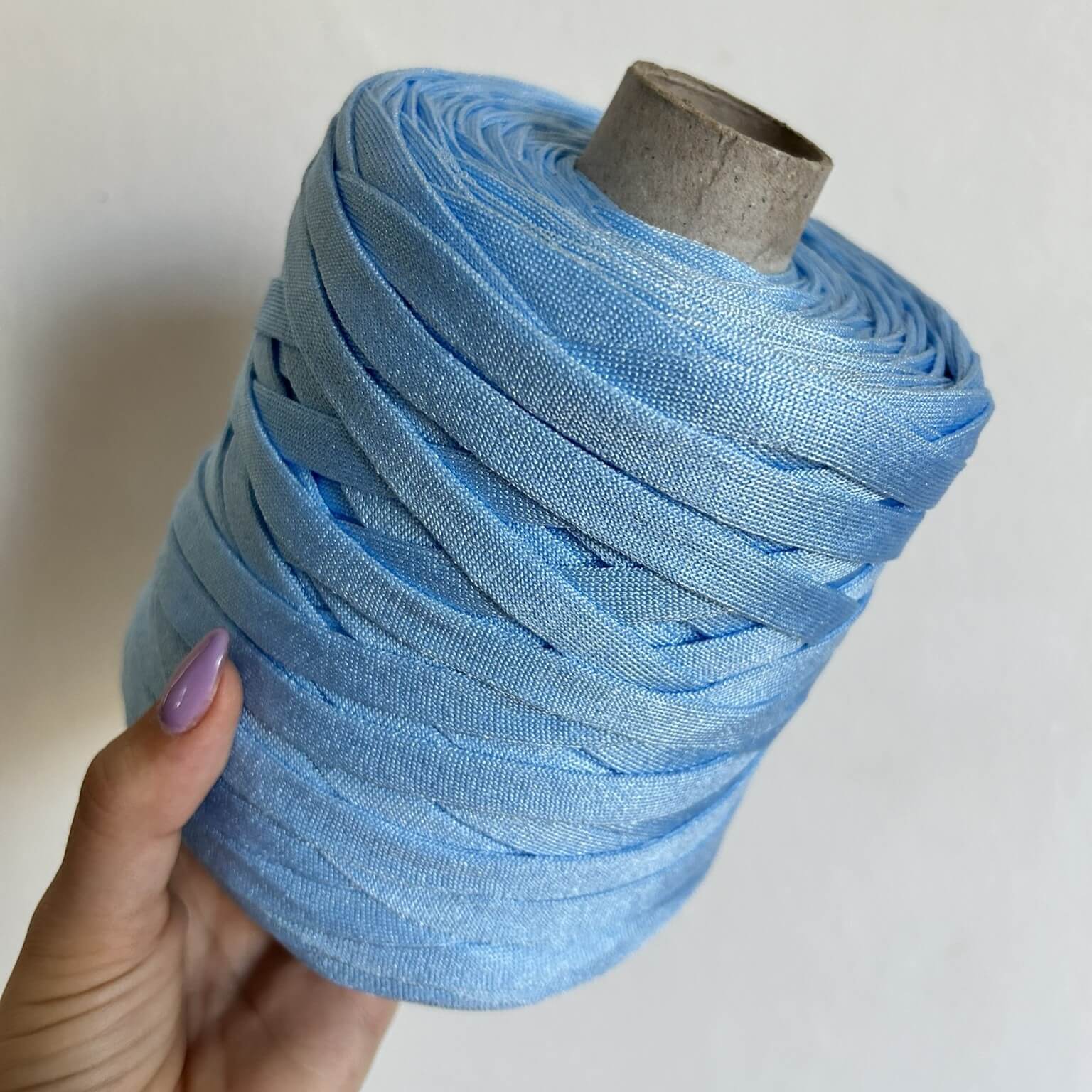Fettuccia in cordino celeste dalla forma a tubolare per borse all'uncinetto - filato made in italy