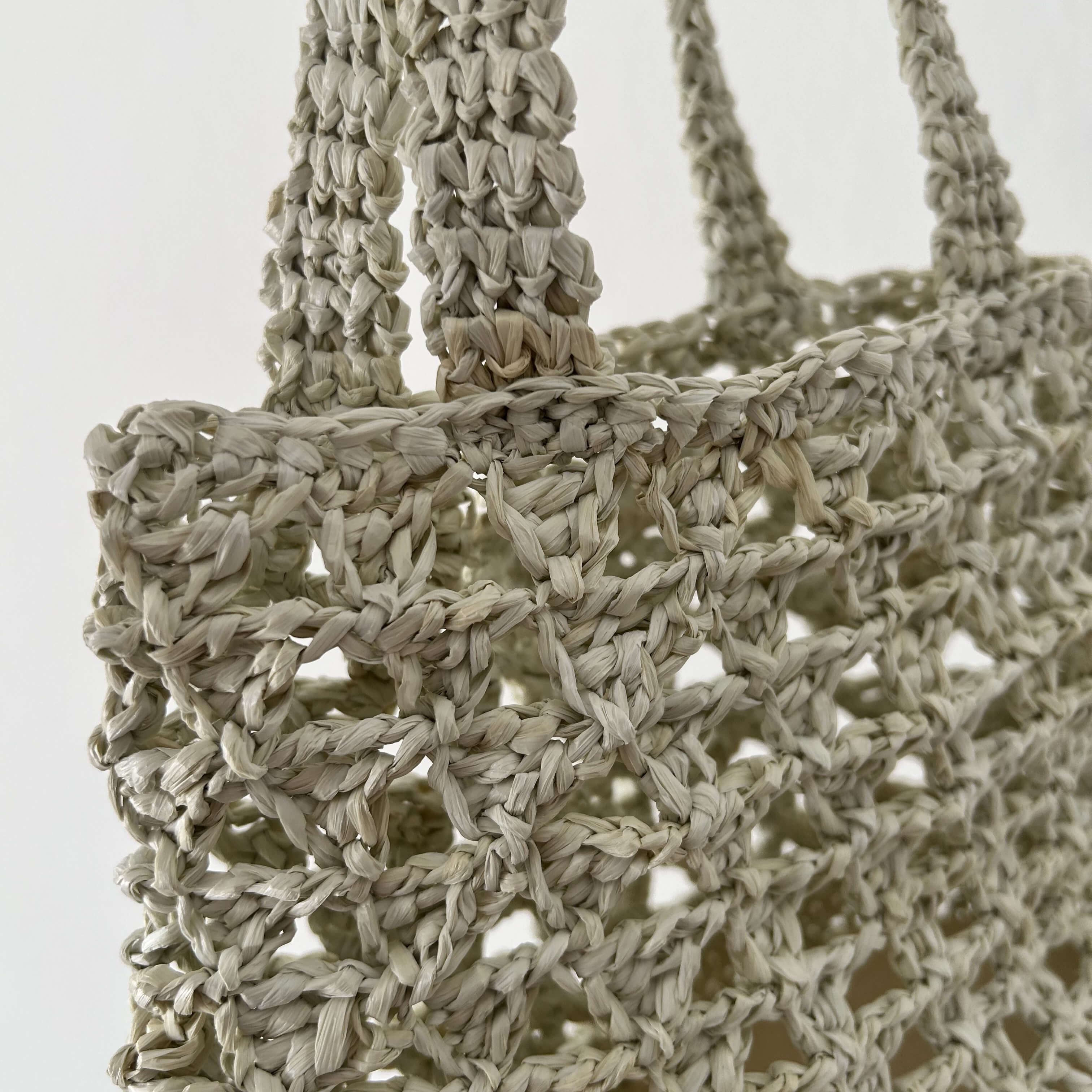 Modello di borsa all'uncinetto realizzata con punto triangolo