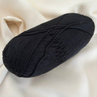 Gomitolo di cotone nero per borse, abiti e accessori all'uncinetto - Filato sottile e morbido dalla forma tubolare