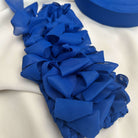 Fettuccia in tulle blu elastica e leggerissima per realizzare borse all'uncinetto